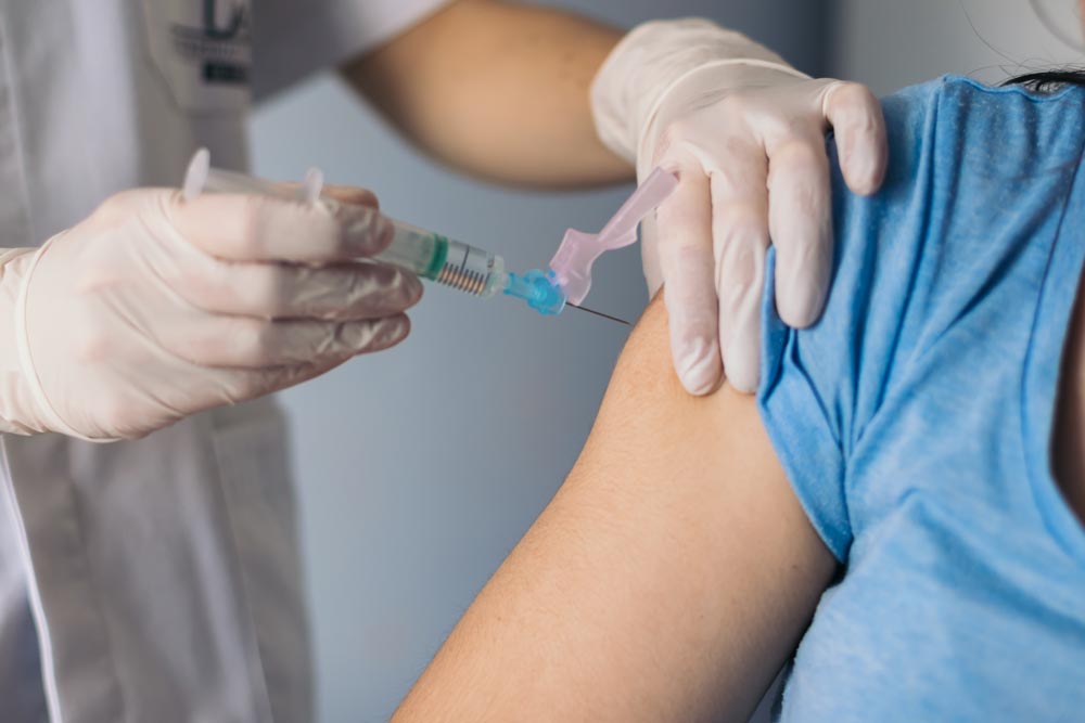Vaccinering på en person